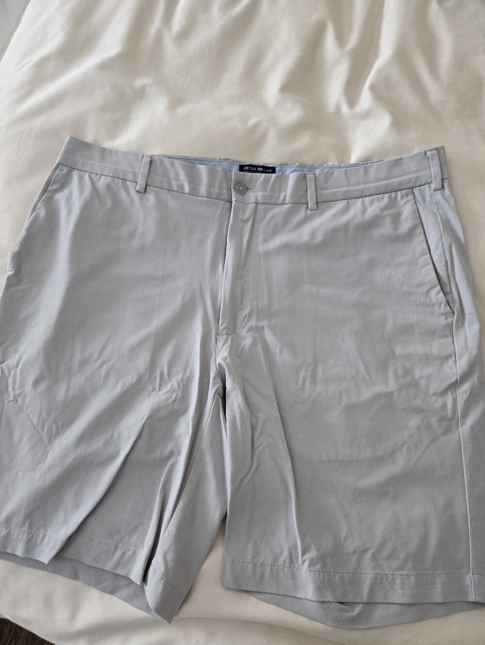 The Peter Millar Crown Crafted flat front Shorts in men's size 38 X 9, Light Blu